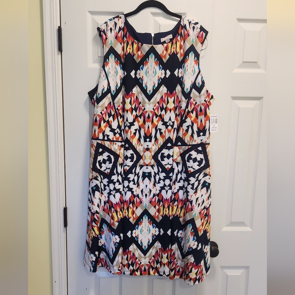 Sleeveless mini dress with piping detail